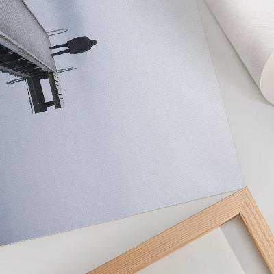 Väggposter En ensam figur på en pir i dimman