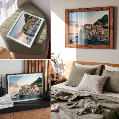 Väggposter Färgglada hus på en klippa ovanför havet