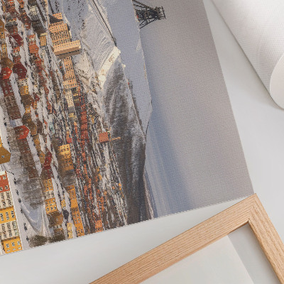 Poster Vinterstad med färgglada byggnader som kontrasterar mot snön