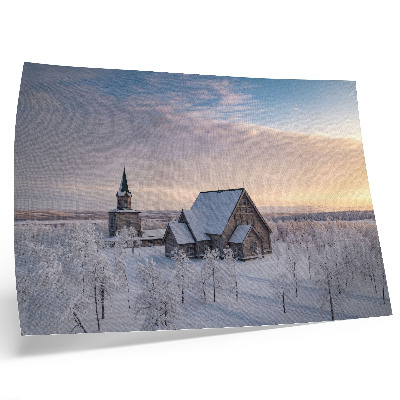 Poster Ett fridfullt vinterlandskap med en träkyrka