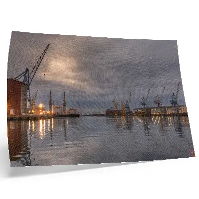 Väggposter atmosfäriska hamnkranar som reflekteras i vattnet