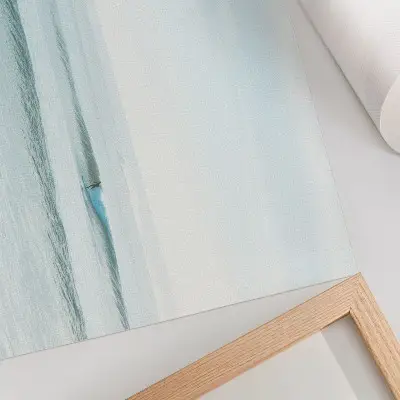 Väggposter med minimalistiskt motiv av surfare i havsvågor