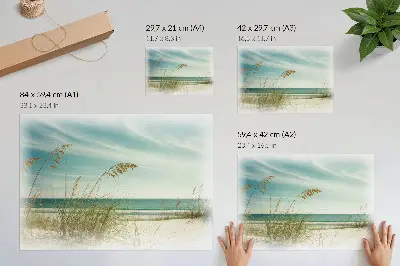 Poster strandgräs vid havet under en himmel i fred