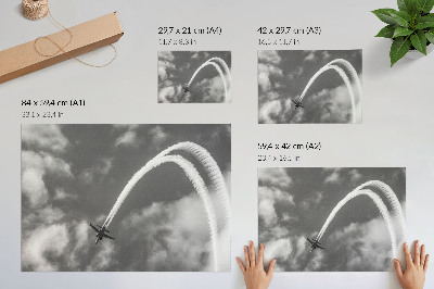 Poster Flygplan på himlen med dynamiska molnstrimmor