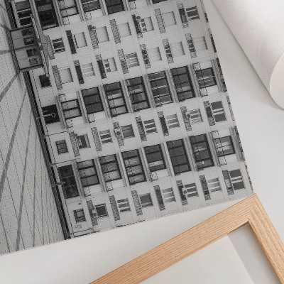Stilren väggposter En modern byggnad med balkonger och ett torg