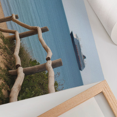 Stilren väggposter Strandskepp hav träräcken sand
