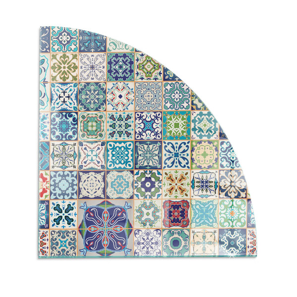 Glasskiva under kamin kvarten Mosaikmönster på kakelplattor