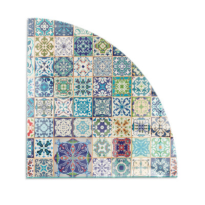 Glasskiva under kamin kvarten Mosaikmönster på kakelplattor
