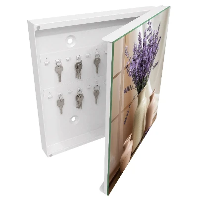 Snygga nyckelskåp Blommor i en vas