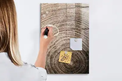 Magnetisk rittavla med motiv av trädets årsringar