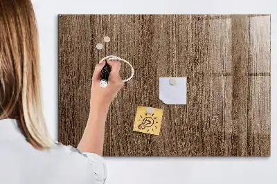 Magnetisk tavla med penna i mörkt trä