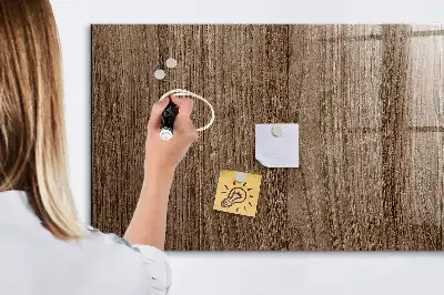 Magnetisk tavla med penna i mörkt trä