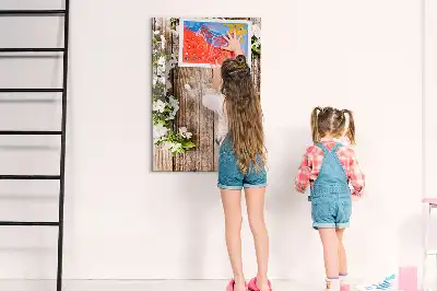 Tavla att skriva på med motiv av blommor på träbrädor