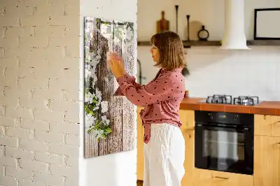 Tavla att skriva på med motiv av blommor på träbrädor