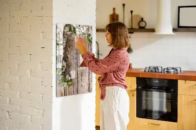 Tavla att skriva på med motiv av blommor på träbrädor