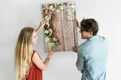 Tavla att skriva på med motiv av blommor på träbrädor