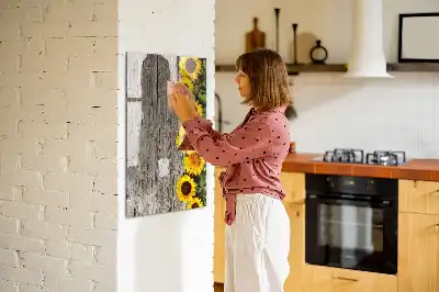 Skrivtavla motiv med solrosor på trä