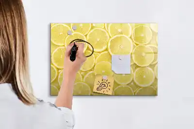 Magnetisk tavla med tillhörande penna och motiv av citronskivor