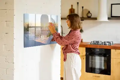 Magnetisk rittavla med motiv av solnedgång på stranden