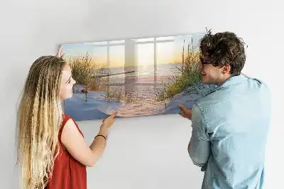 Magnetisk rittavla med motiv av solnedgång på stranden