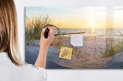 Magnetisk rittavla med motiv av solnedgång på stranden