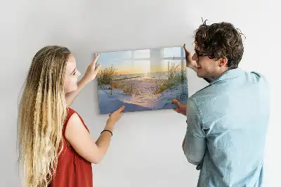 Magnetisk rittavla med motiv av solnedgång på stranden