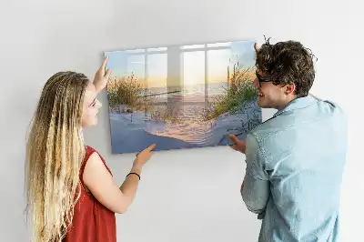 Magnetisk rittavla med motiv av solnedgång på stranden
