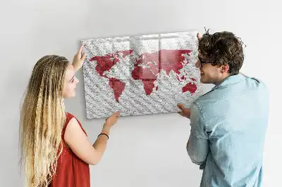 Magnetisk tavla med motiv av världskarta på tegelvägg och penna