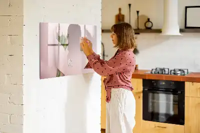 Magnetisk tavla med penna och motiv av blombukett
