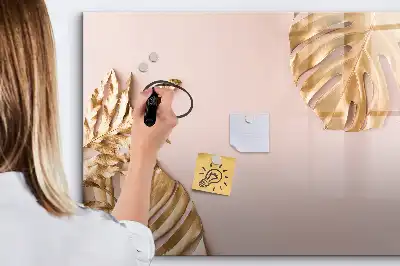 Magnetisk rittavla med motiv av gyllene tropiska blad