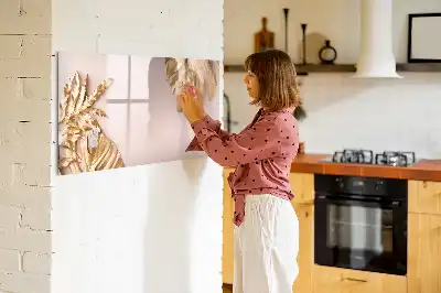Magnetisk rittavla med motiv av gyllene tropiska blad