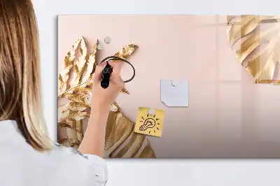 Magnetisk rittavla med motiv av gyllene tropiska blad