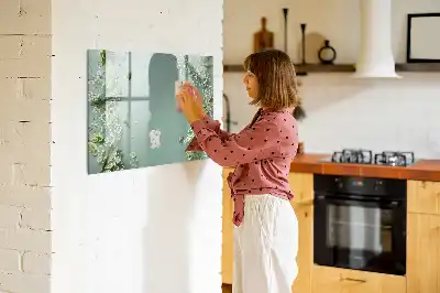 Magnetisk tavla med penna med motiv av subtila blommor