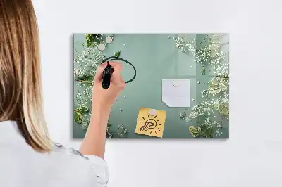 Magnetisk tavla med penna med motiv av subtila blommor