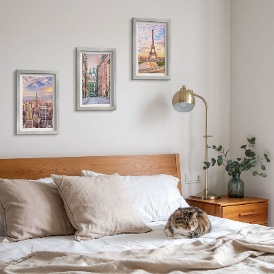 Posterpaket Utsikt över städerna New York, Paris och Warszawa i skymningen