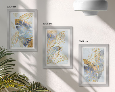Tavelvägg med 3 tavlor Blad i nyanser av blått och beige mot en ljus bakgrund