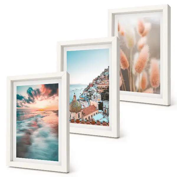Posterpaket havsutsikt med solnedgång, färgglada hus och blommor