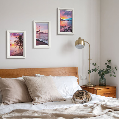 Tavelvägg med 3 tavlor Solnedgångar över bron och vattenlandskapet