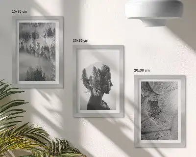Tavelvägg med 3 tavlor med motiv av skog i dimman och träd med maskrosor