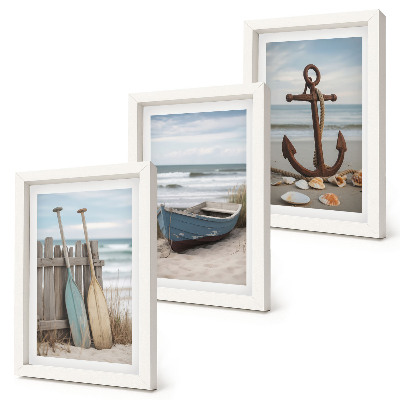 Posterpaket En strand med en roddbåt och ett ankare i sanden