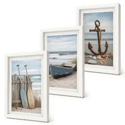 Posterpaket strand med en roddbåt och ett ankare i sanden