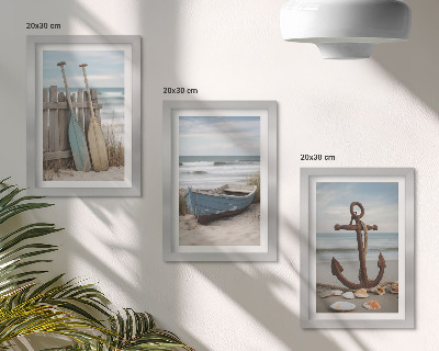 Posterpaket En strand med en roddbåt och ett ankare i sanden