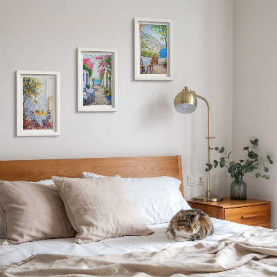 Triptyk tavla med ram Charmiga gator med blommande växter och havsutsikt