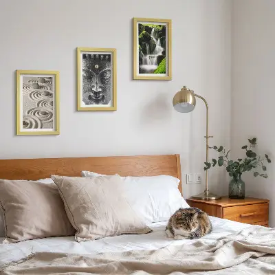 Tavelvägg med 3 tavlor med motiv av natur, stenar, vattenfall och Buddha