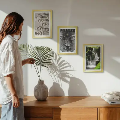 Tavelvägg med 3 tavlor med motiv av natur, stenar, vattenfall och Buddha