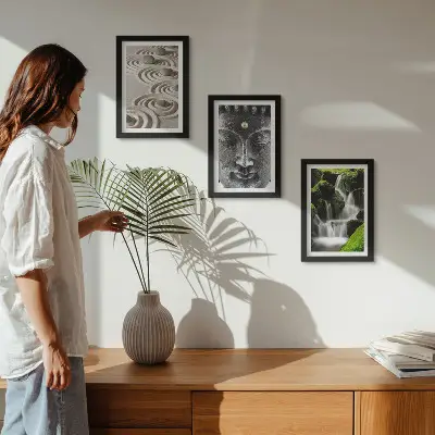 Tavelvägg med 3 tavlor med motiv av natur, stenar, vattenfall och Buddha