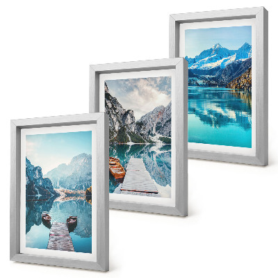 Triptyk tavla med ram Bergsjöar med båtar och reflektioner i vattnet