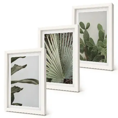 Triptyk med tropiska blad i pastellfärger tavla med ram