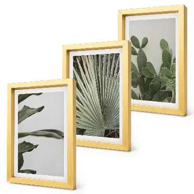Triptyk med tropiska blad i pastellfärger tavla med ram