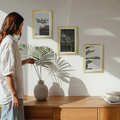 Triptyk med krukväxter med rustika blad tavla med ram